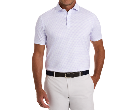 Man wearing The Walton Shirt: Tudor, a light short-sleeve polo with micro-pattern, paired with light trousers and dark belt, showcasing AIRATION® fabric's breathability and comfort.