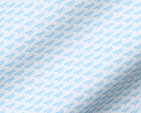 The Walton Shirt: Vista Blue features a white fabric with light-blue eyeglass frame motifs, showcasing AIRATION® fabric's texture and breathability for comfort and sun protection.