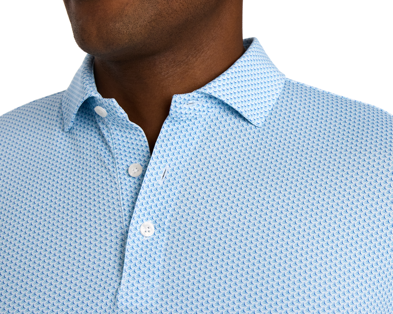 The Lennox Shirt: Harbor & Maidstone Blue, features a light-blue, button-front collared design with a subtle geometric pattern, offering comfort and UPF 30+ protection.