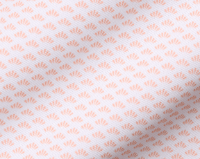 The Geiger Shirt: Nectarine features a white woven fabric with a repeating peach fan motif, highlighting its breathable, moisture-wicking pique texture and structured collar.