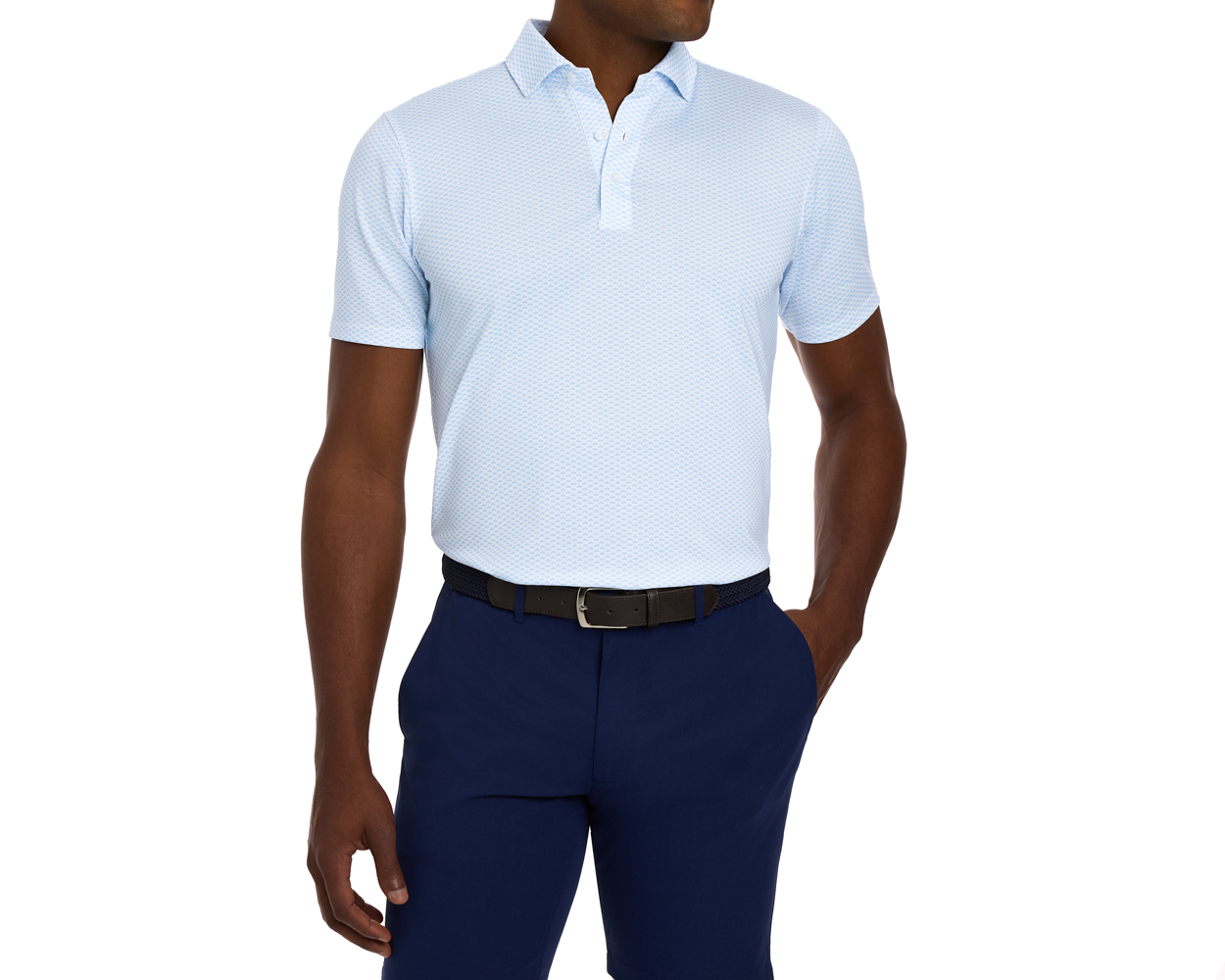 The Geiger Shirt: Vista Blue, a light-blue polo with a textured pattern, shown with navy trousers and a black woven belt, offering breathable comfort and UPF 30+ protection.