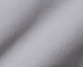 Close-up of The Harwood Boys Short: Gray, highlighting its finely textured, light gray fabric with a gentle fold, emphasizing its softness and performance features.