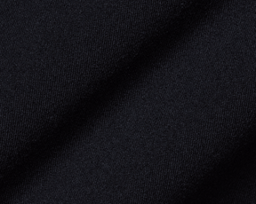 Close-up of The Jackson Boys Hoodie: Black, showcasing its textured, dark woven fabric, highlighting the smooth, soft 4-way stretch material and streamlined design.