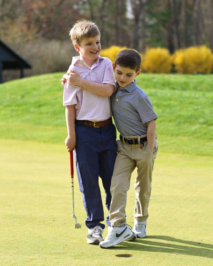 Boys Wearing Golf Clothes on Golf Course