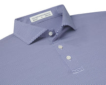 Folded Holderness and Bourne navy and white polo shirt.
