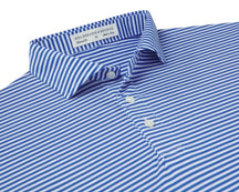 Folded Holderness and Bourne blue and white striped polo.