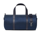Navy banker bag with dark leather straps and detailing from Holderness and Bourne.