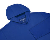 Folded Holderness and Bourne blue pullover.