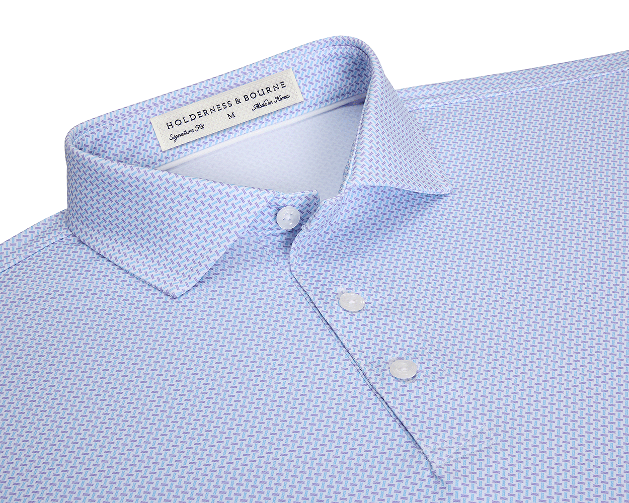 The Norman Shirt: Vista Blue & Tudor, featuring a spread collar, white buttons, and a light blue crosshatch pattern, highlighted by a HOLDERNESS & BOURNE label.