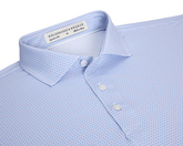 The Norman Shirt: Vista Blue & Tudor, featuring a spread collar, white buttons, and a light blue crosshatch pattern, highlighted by a HOLDERNESS & BOURNE label.