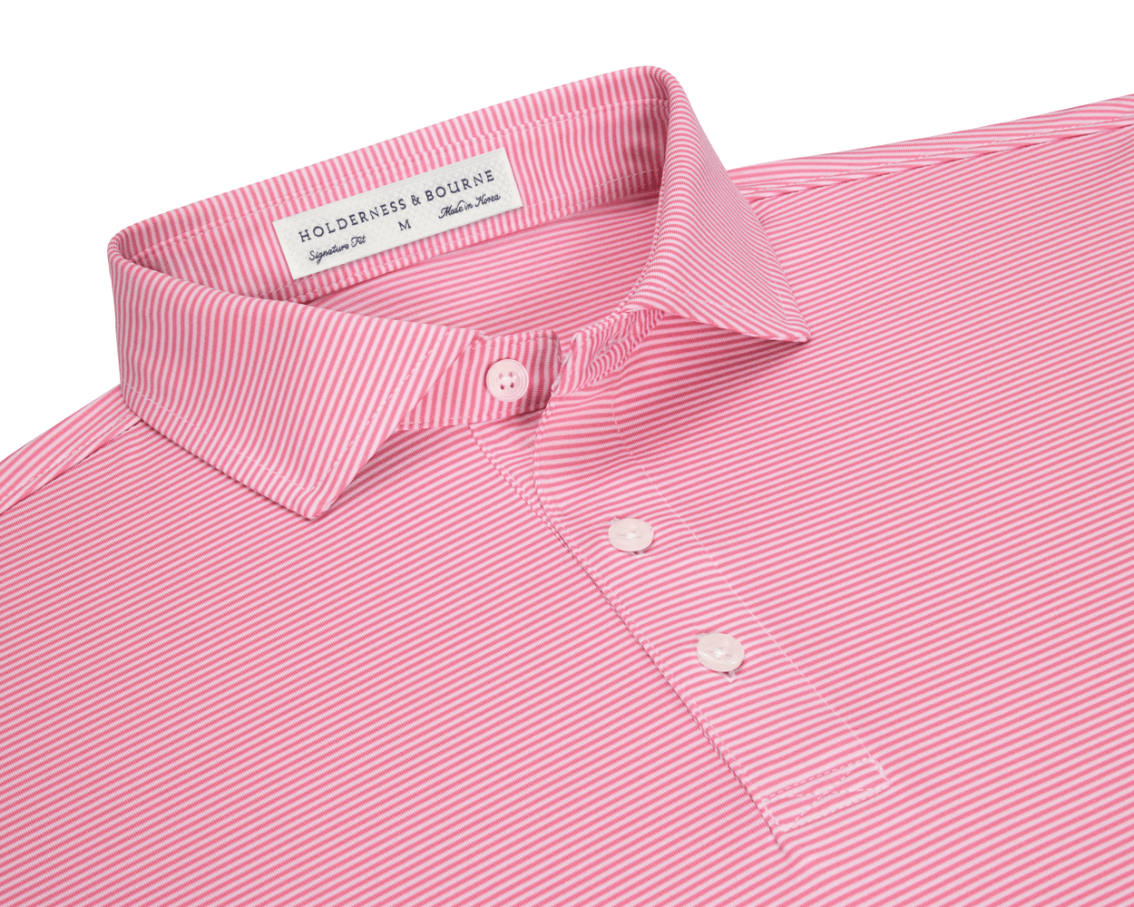 The Perkins Shirt: Belmont & White features a pink and white micro-stripe, point collar, three-button placket, and a label “Holderness & Bourne – Signature Fit.”