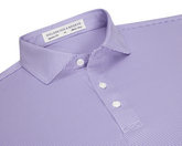 The Perkins Shirt: Tudor & White, a striped polo with a structured collar, three-button placket, and embroidered label, offers performance fabric with four-way stretch.