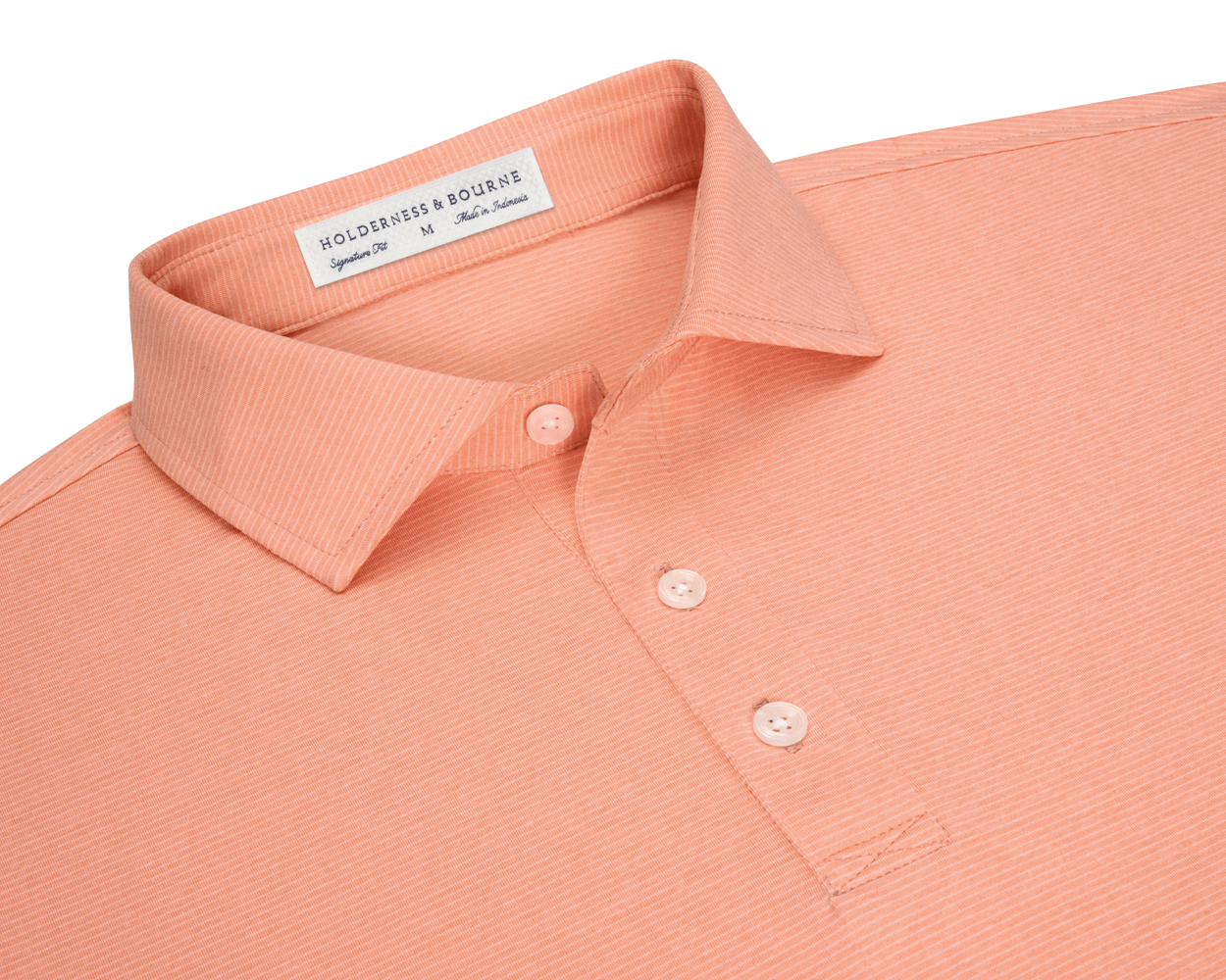 The Holland Shirt: Heathered Nectarine, a medium polo featuring micro-stripes, classic soft collar, and three-button placket, crafted in lightweight fabric for comfort.