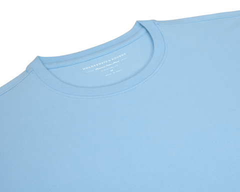 The Mason T-Shirt: Vista Blue, light-blue crew-neck featuring Holderness & Bourne branding, crafted from a premium Peruvian pima cotton blend for comfort and durability.