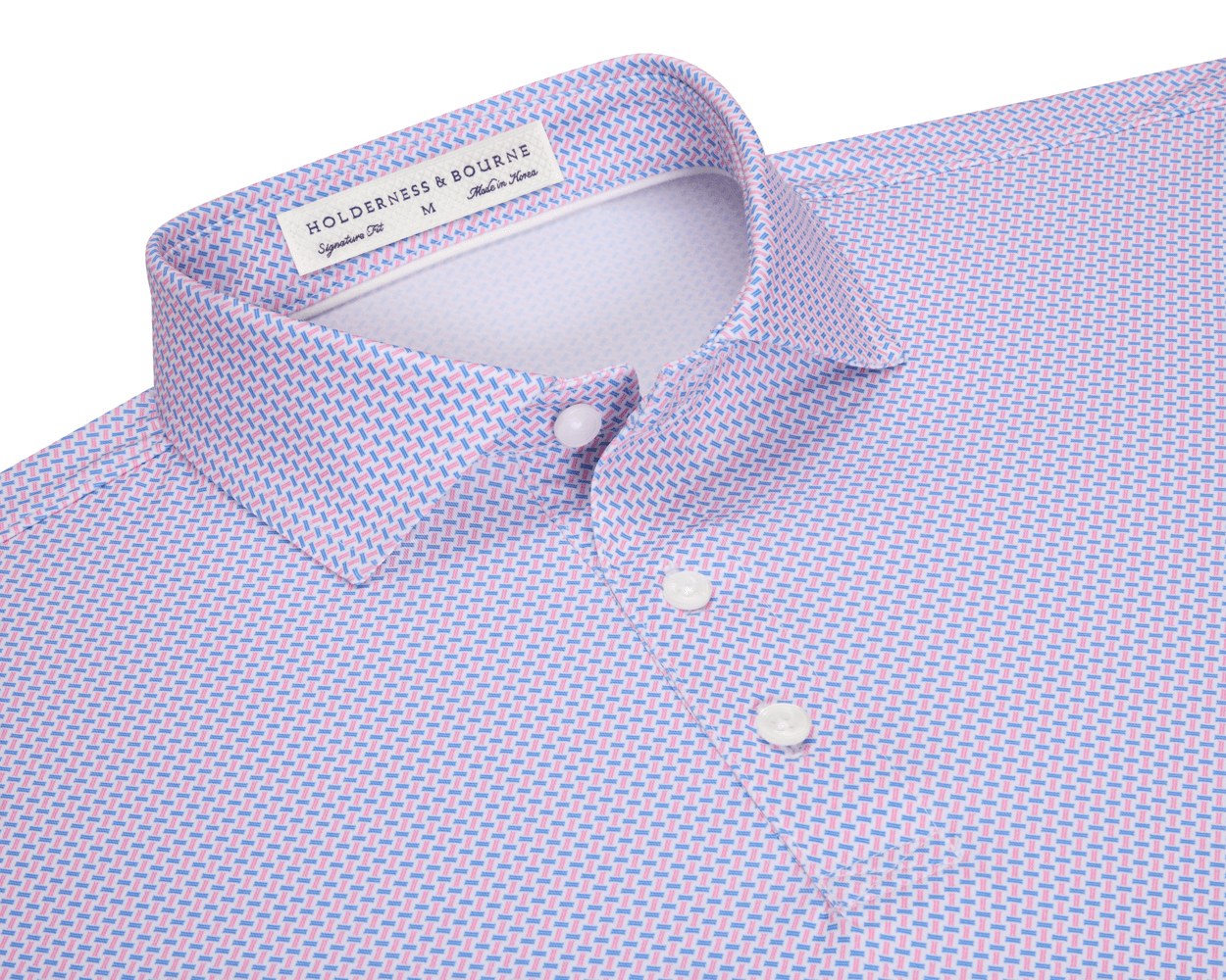 The Norman Shirt: Belmont & Horizon Blue, features a light blue and pink geometric pattern, classic point collar, white buttons, and structured spread collar for versatile style.