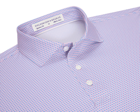 The Norman Shirt: Belmont & Horizon Blue, features a light blue and pink geometric pattern, classic point collar, white buttons, and structured spread collar for versatile style.