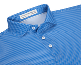 The Eaton Shirt: Horizon Blue, featuring a structured spread collar, three white buttons, and an abstract wave pattern, crafted for comfort and sun protection.