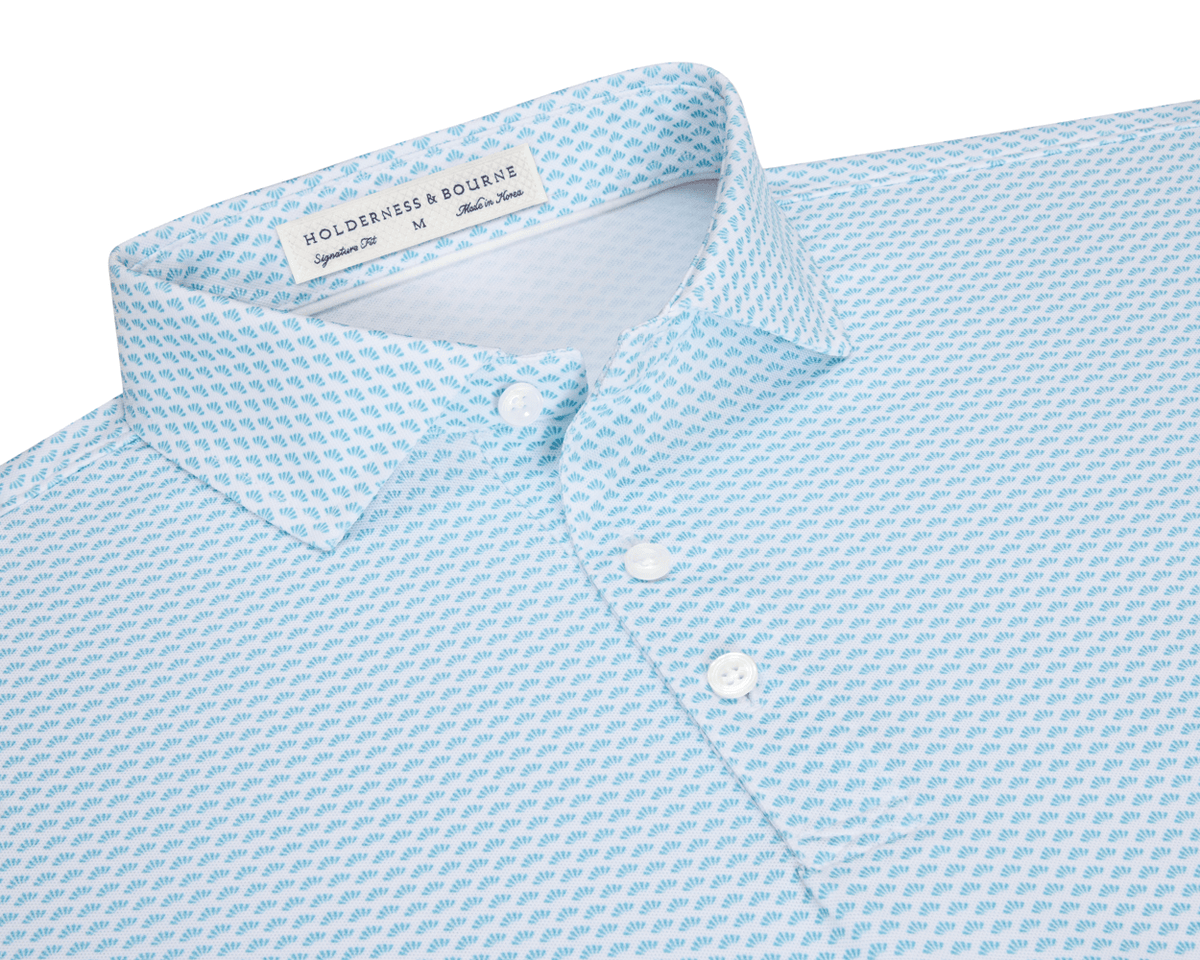 The Geiger Shirt: Harbor, featuring a light-blue fan print, classic collar, three-button placket, and breathable pique fabric with UPF 30+ protection.