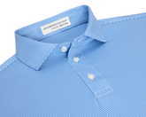 The Perkins Boys Shirt: Horizon Blue & White features a pinstripe design, spread collar, and three-button placket, crafted from breathable, moisture-wicking DryLuxe fabric with UPF 50+ protection.