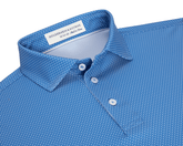 The Hicks Boys Shirt: Horizon Blue—short-sleeve polo with a white dash pattern, classic collar, and three-button placket, offering breathability and UPF 50+ protection.