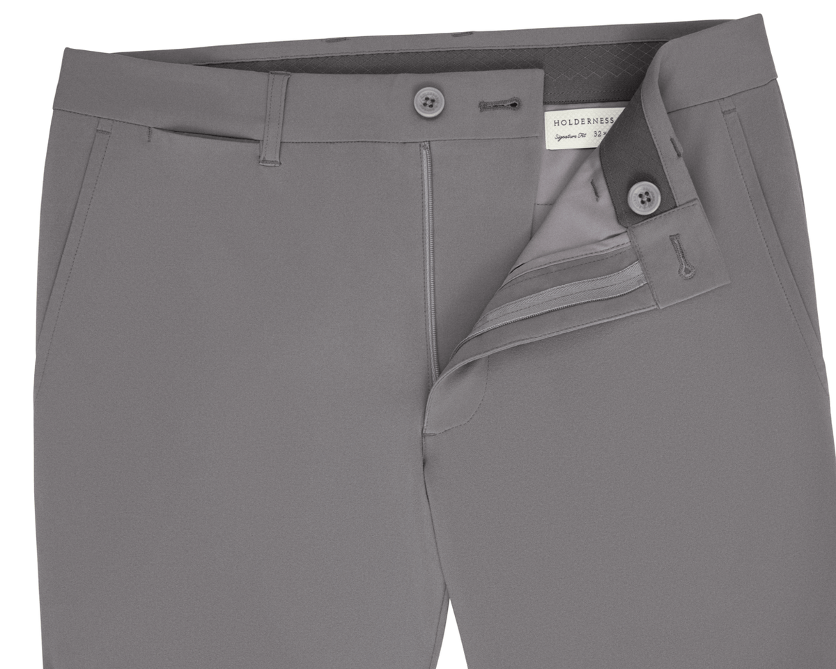 Holderness & Bourne Men’s Light Gray Golf Pants unbuttoned on white background