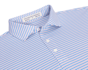 The Granville Shirt: Horizon Blue & Cabernet features a striped, button-front design with a structured collar, offering breathability, moisture wicking, and UPF 30+ protection.