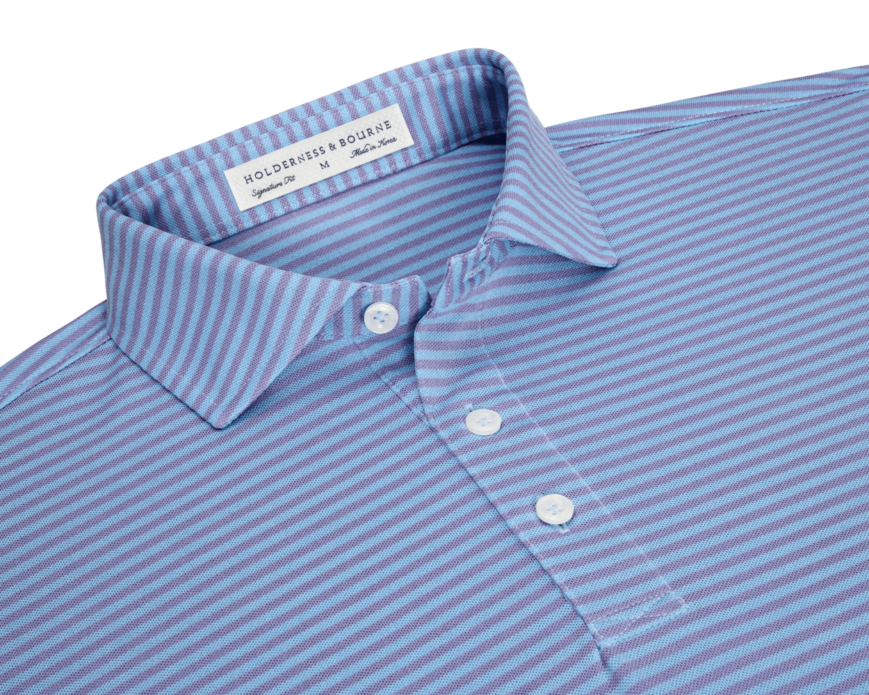 The Maxwell Shirt: Tudor & Vista Blue, a men's short-sleeve polo with a spread collar and three-button placket, features light blue and lavender stripes.