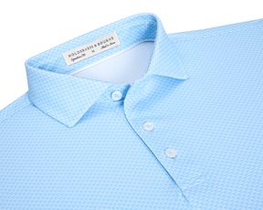 The Eaton Shirt: Vista Blue, a light-blue polo with a pointed collar, three-button placket, and woven texture, offers moisture-wicking and UPF 30+ protection.