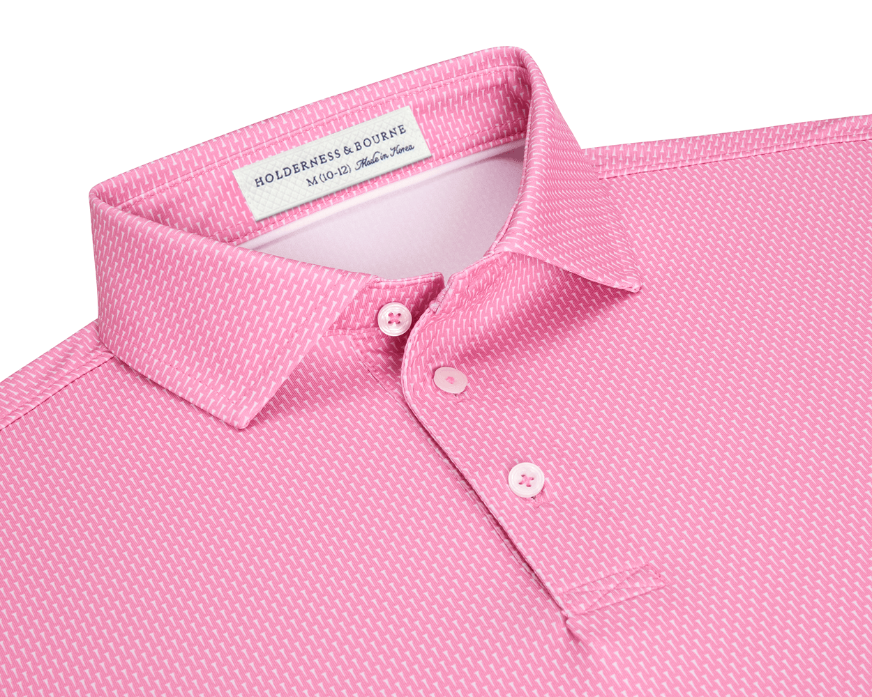 The Hicks Boys Shirt: Belmont, a pink polo with white geometric pattern, features a three-button placket, structured collar, and Holderness & Bourne label.