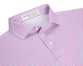 The Justice Boys Shirt: Horizon Blue & Cabernet, featuring a pink geometric eagle pattern, classic point collar, and three-button placket, made from performance fabric for comfort and sun protection.