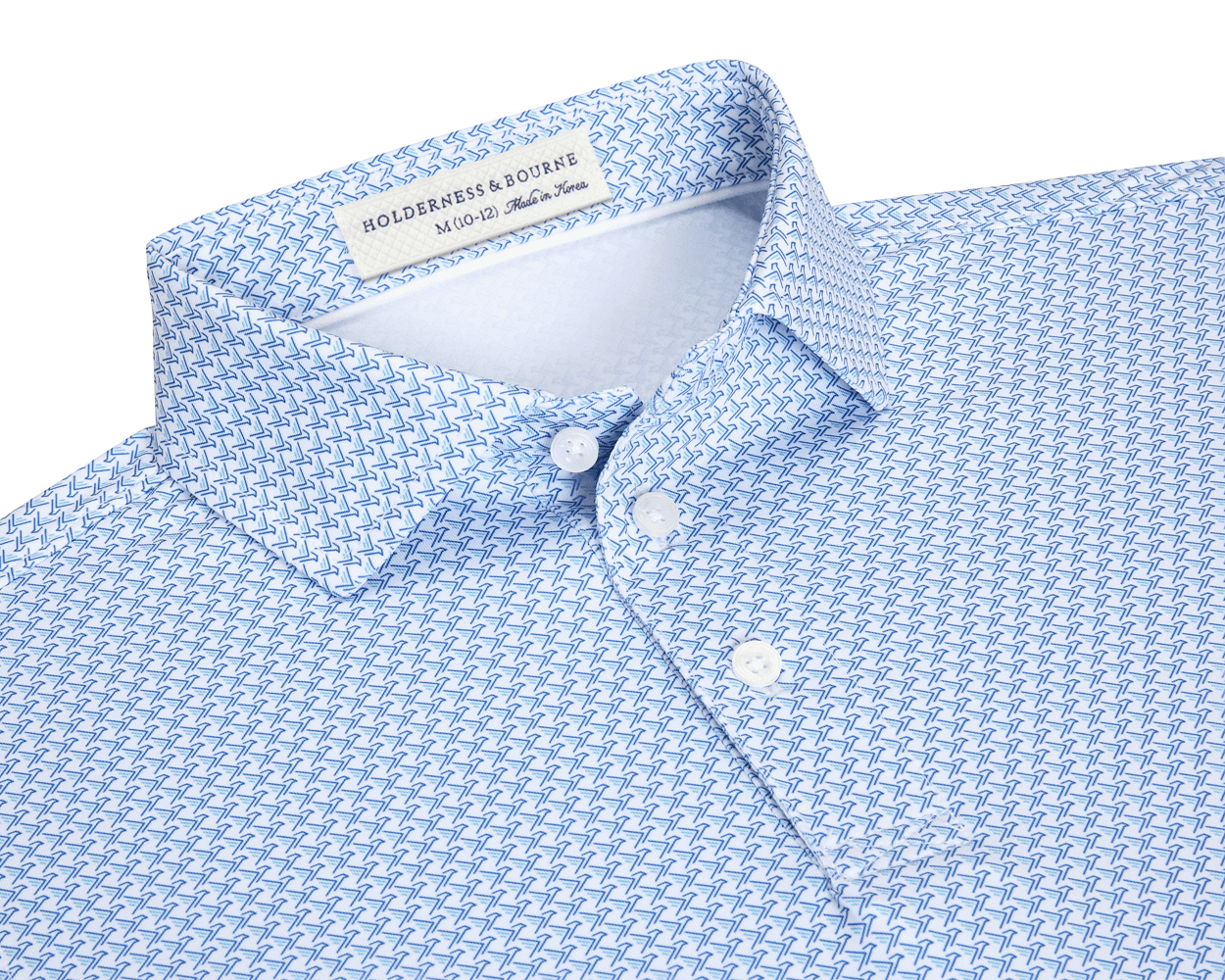 The Justice Boys Shirt: Harbor & Maidstone Blue features a light blue polo with a geometric eagle pattern, offering four-way stretch and UPF 50+ protection.