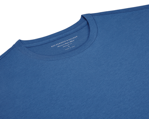The Mason T-Shirt: Maidstone Blue, a close-up of a plain blue crew-neck, showcasing the Holderness & Bourne label inside the collar.