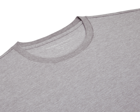 The Mason T-Shirt: Heathered Gray, showcasing its crew-neck, light-gray fabric with visible collar and shoulders, highlighting the luxurious Peruvian pima cotton blend.