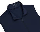 The Swenson Vest: Navy, a sleeveless, zip-front vest by Holderness & Bourne, features lightweight Thermore® insulation and stretch fabric for optimal golf performance.