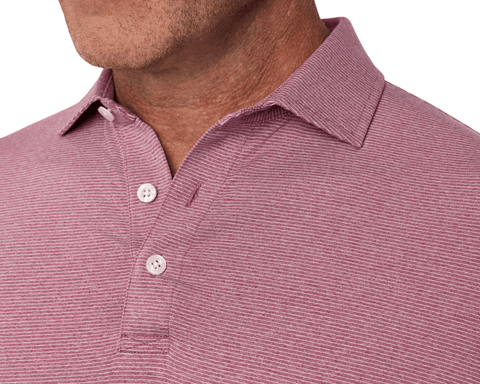 Close-up of a male model wearing The Holland Shirt: Heathered Napa, showing the spread collar, three-button placket, and subtle repeat stripe.