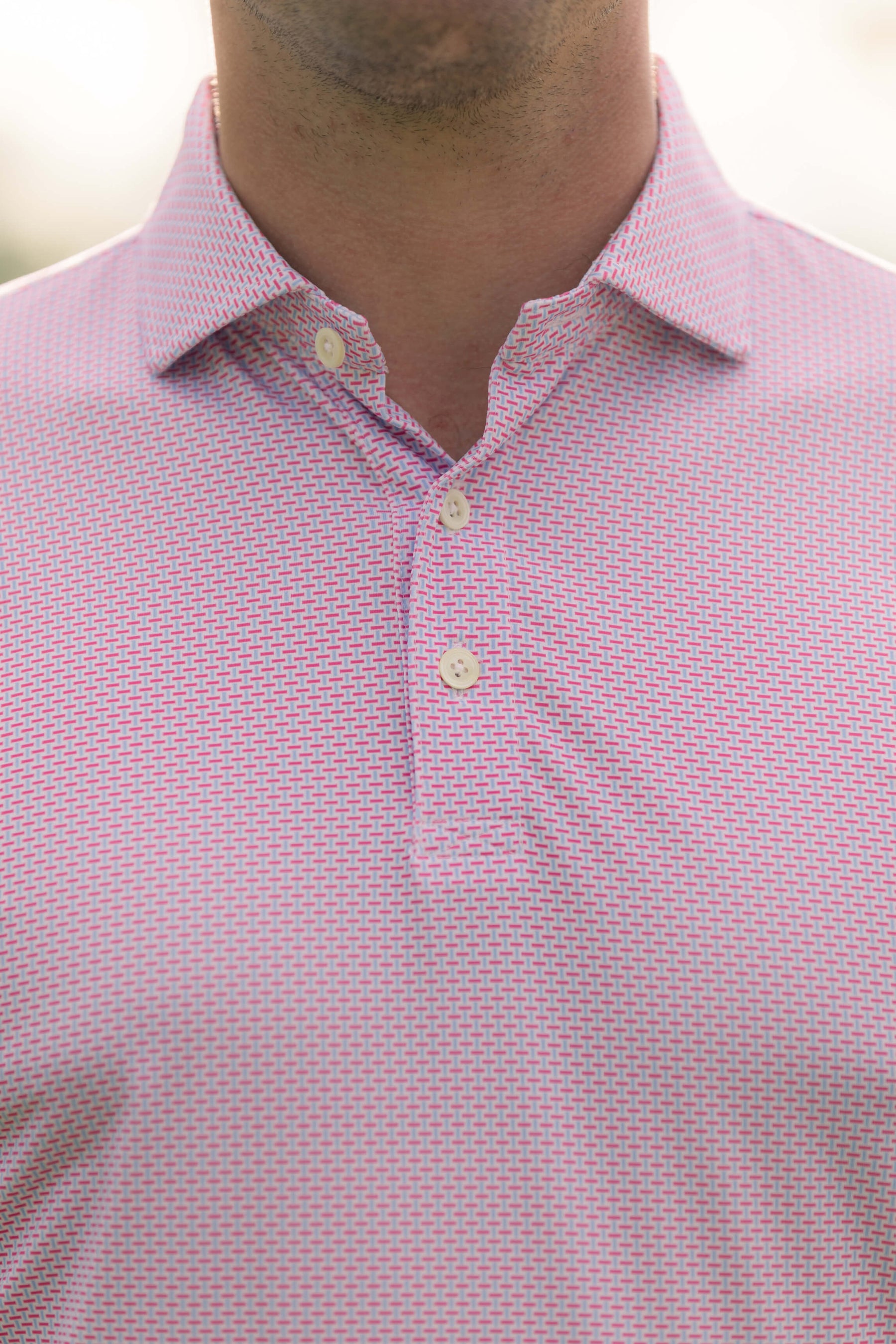 Man Wearing Pink Polo Shirt