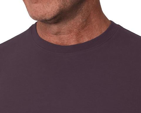 Close-up of a model wearing The Mason T-Shirt: Vineyard, detailing the ribbed crew neckline and stitched collar seam.