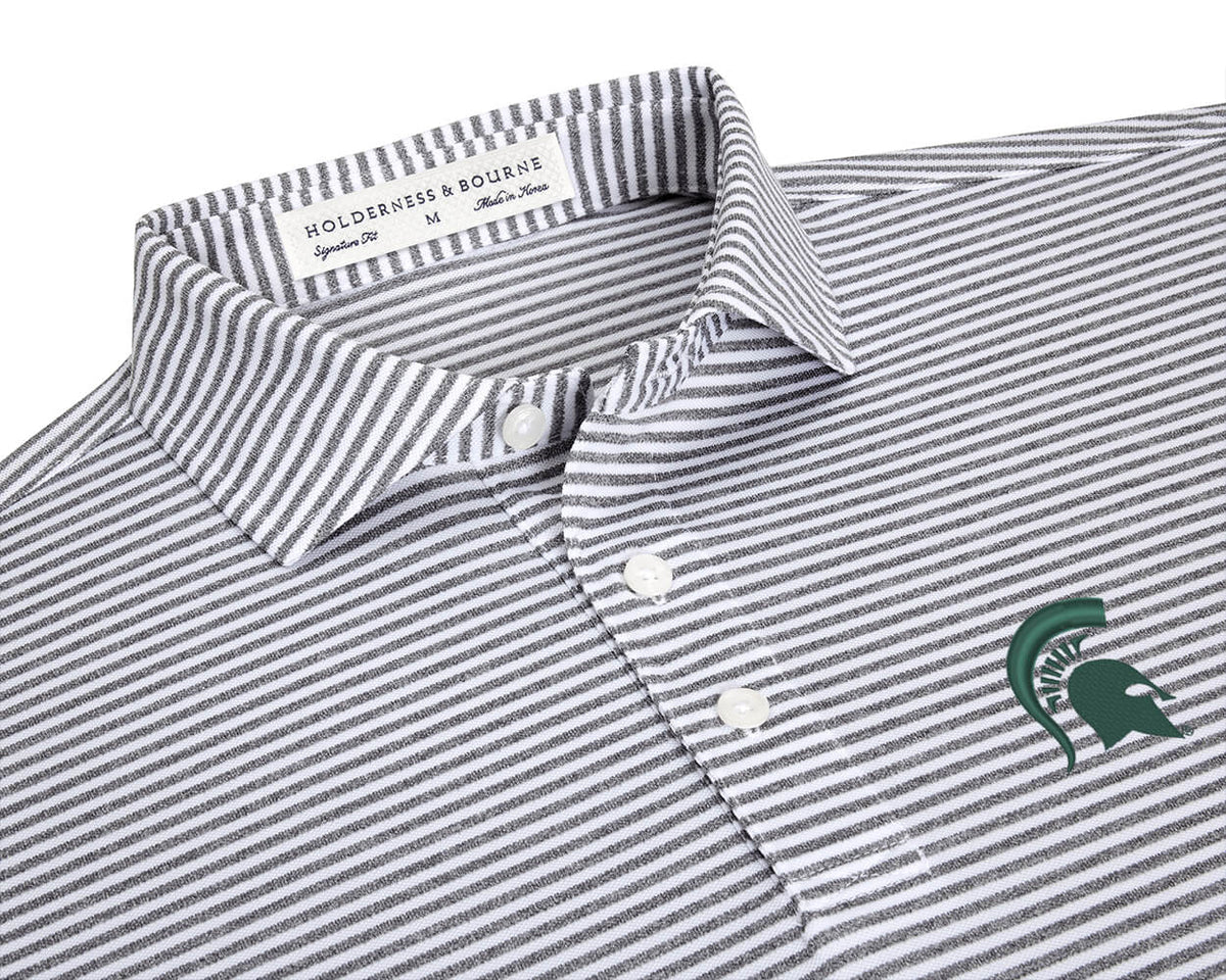 Close-up of Michigan State University Maxwell Shirt: Gray & White flat-lay showing its gray and white stripes, spread collar, and green Spartan helmet logo.