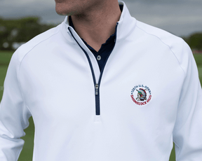 Person wearing the 2026 U.S. Open Rodgers Pullover: White, featuring a quarter-zip design and embroidered logo, ideal for golfing and casual gatherings.