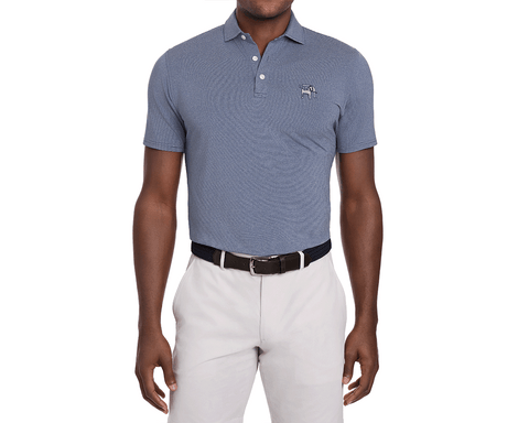 Male model in Yale Golf Course Holland Shirt: Heathered Andover, blue-and-white micro-striped polo with embroidered logo, tucked into khaki trousers, dark belt visible.