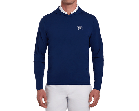 Man wearing Yale Golf Course Jackson Pullover: Navy, slim-fit with small white bulldog logo, over white shirt, paired with light-colored pants.