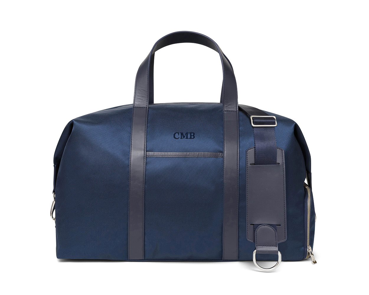 Navy embroidered travel bag with dark adjustable leather strap and embroidered lettering from Holderness and Bourne.
