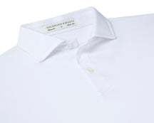 Folded Holderness and Bourne white cotton polo.