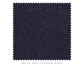 Close up shot of navy sweater material from Holderness and Bourne.